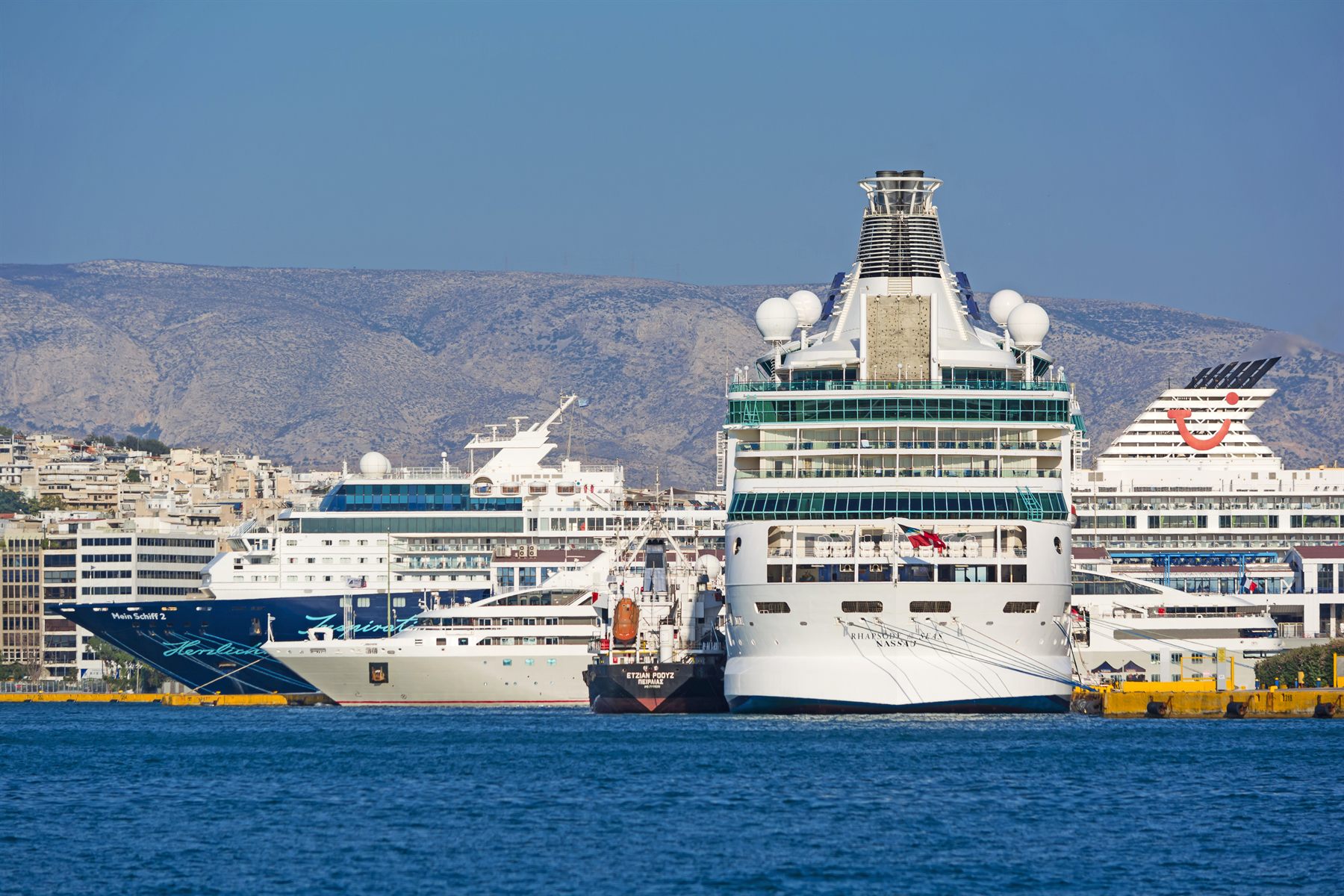 Cruise ships berthed in the port of Piraeus, the gateway to Athens, Greece