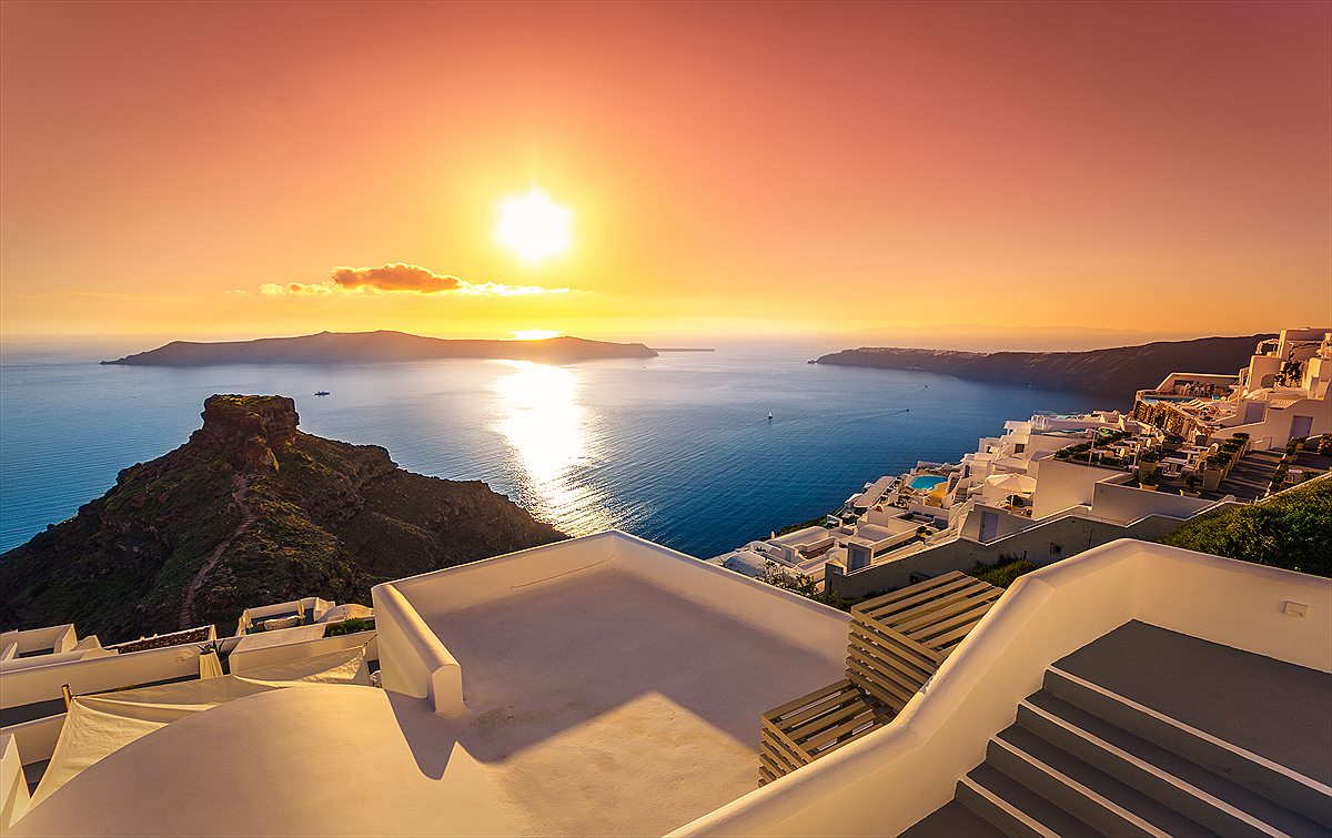 Whitewashed Greek island village above the Aegean Sea